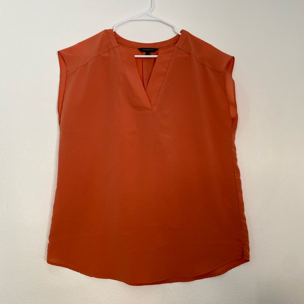 Banana Republic orange blouse.